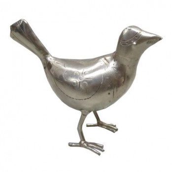 Птица выполненная из белого металла